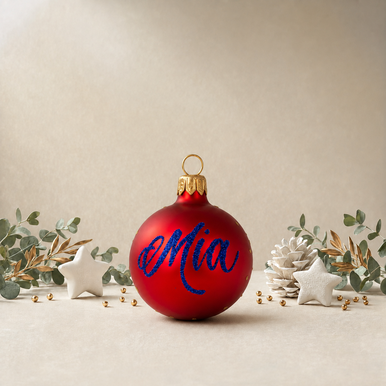Small Gold Snowflakes on Red Bauble