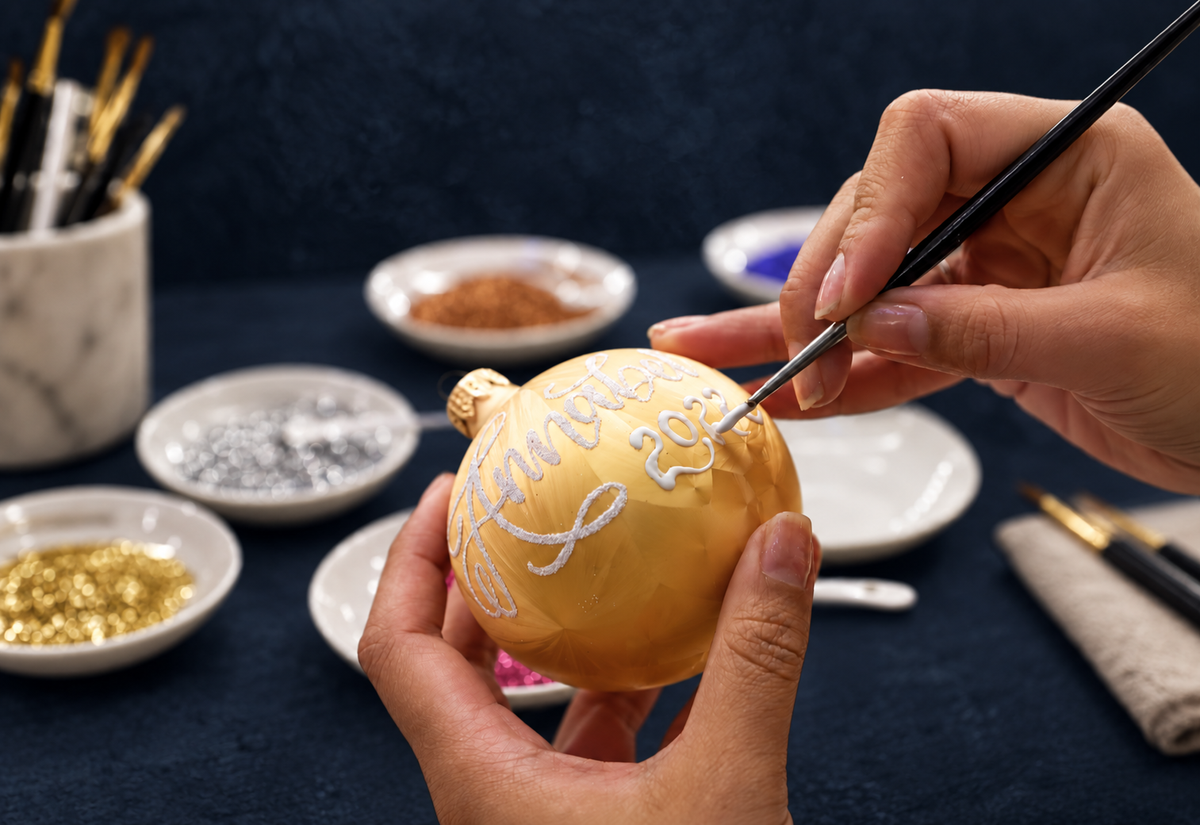 Hand-personalising an Artisan Ornaments bauble