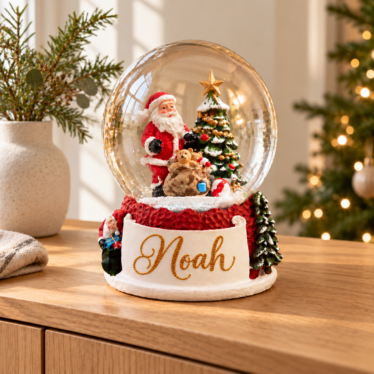 Santa Snow Globe, styled on a wooden sideboard